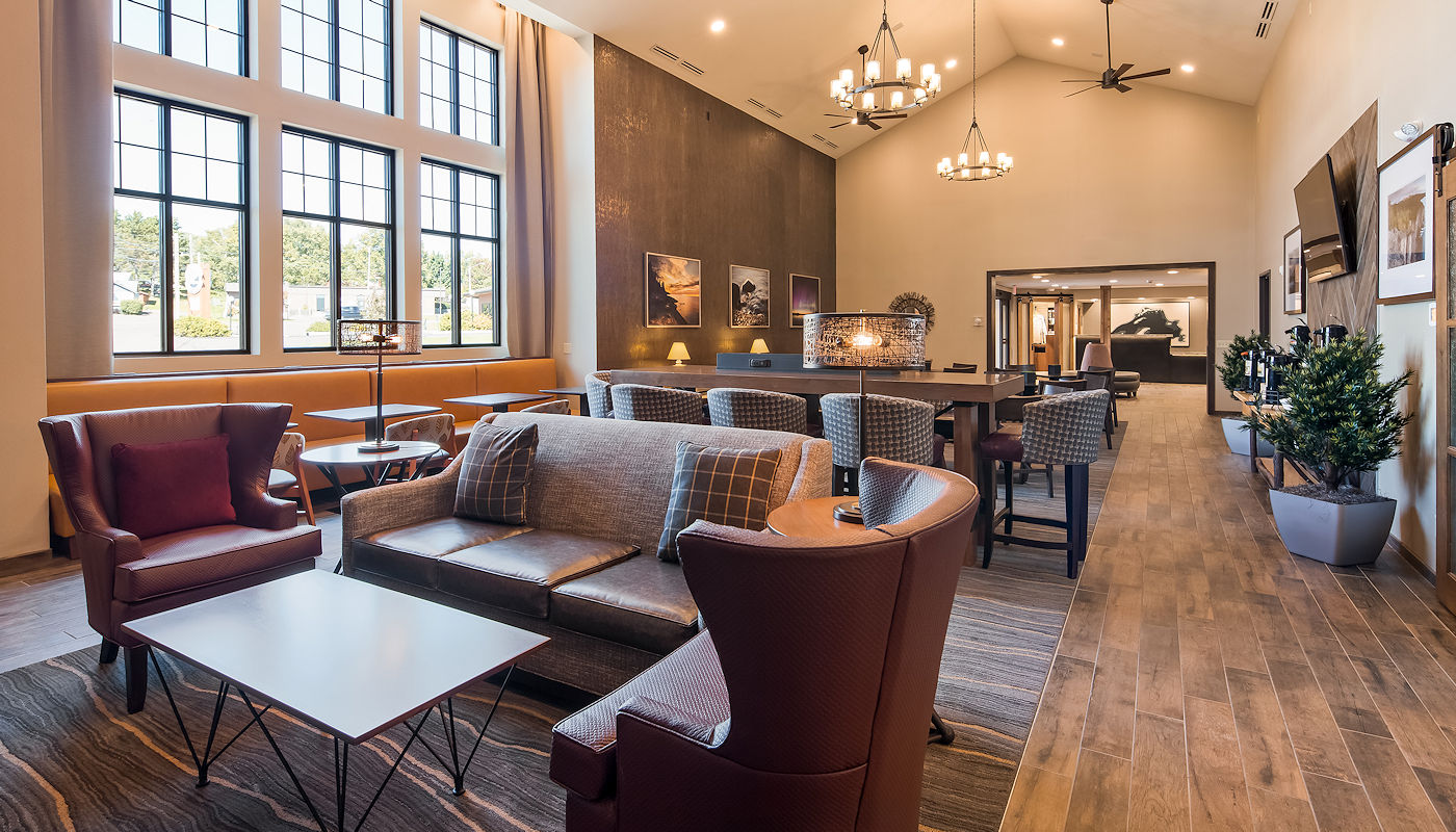 Relax with friends in Superior Inn & Suites Fireside Great Room Grand Marais Major Attractions - Superior Inn Grand Marais